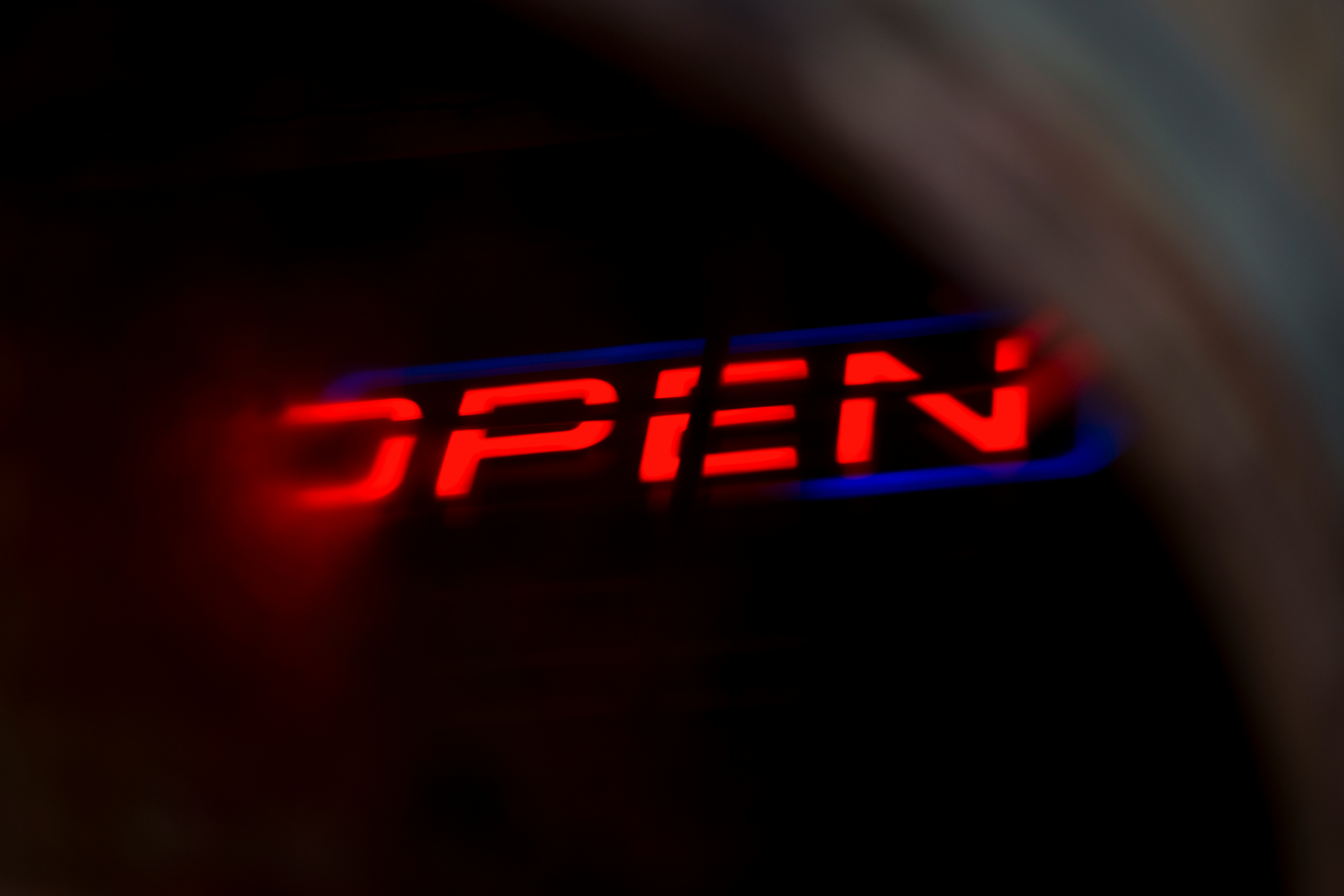 red open neon light signage